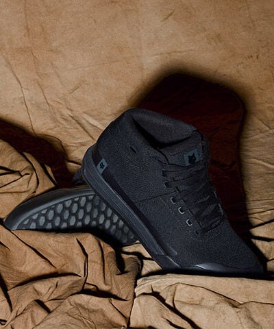 Speedframe bike helmet floating with vegetation in the back